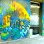 Fresque Murale mur gauche avant l'entrée de la Maison du Monde